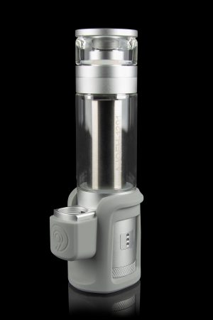 Silver cannabis vaporizer with a glass chamber and digital display, isolated on a black background.