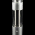 Sleek silver cannabis oil rig with a glass bubbler chamber, displayed against a black background.