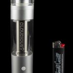 Silver Cloudious9 vaporizer pen and lighter on a reflective surface.