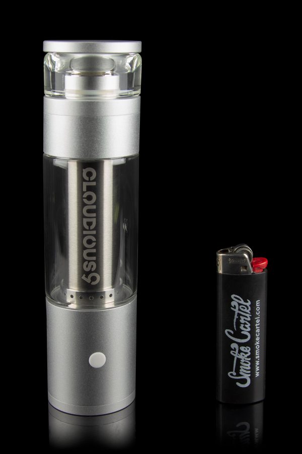 Silver Cloudious9 vaporizer pen and lighter on a reflective surface.