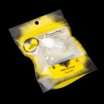 Sealed yellow mylar bag labeled “Honeybee Herbs” containing a glass cannabis oil recycler.