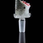 A studio shot of the Empire Glassworks "Jawsome" Bowl Piece, showcasing its shark-shaped glass design with a detailed joint.