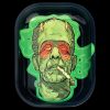 A close-up, overhead view of the “Kill Your Culture “Frankenstoned” Rolling Tray” depicts a Frankenstein-inspired design with vibrant green accents.