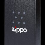 Black Zippo cannabis storage case with silver logo.
