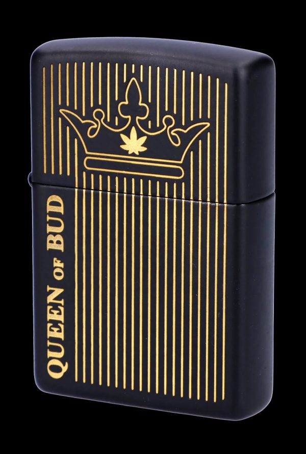 Black Zippo-style lighter with gold vertical lines and a cannabis leaf crown design, reading "Queen of Bud."