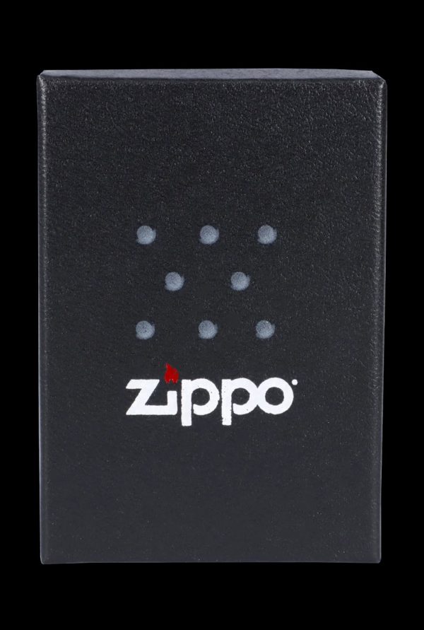 Black Zippo lighter with cannabis leaf design.