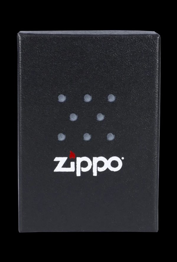 Black Zippo lighter box with a cannabis leaf pattern and logo.