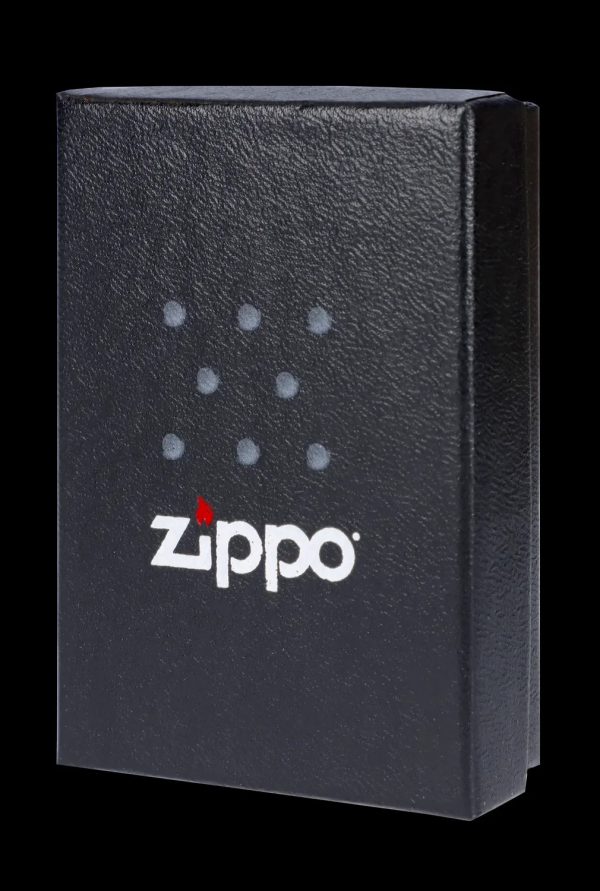 Black Zippo lighter box with white logo and cannabis leaf pattern.