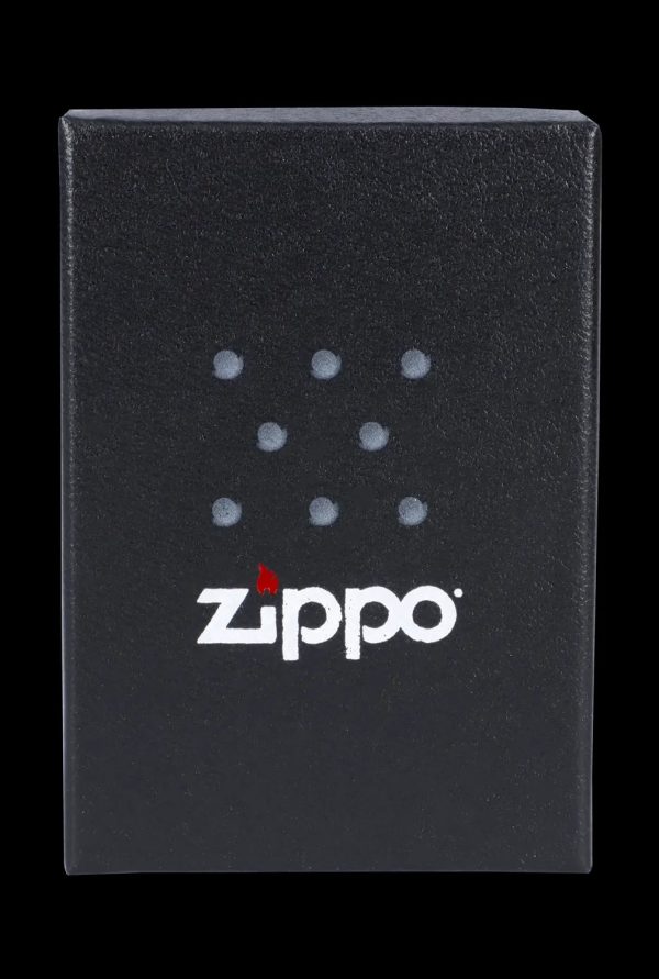 Black Zippo lighter with a cannabis leaf design.