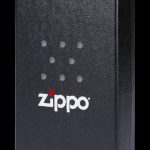 Black Zippo lighter with a constellation pattern and white logo.