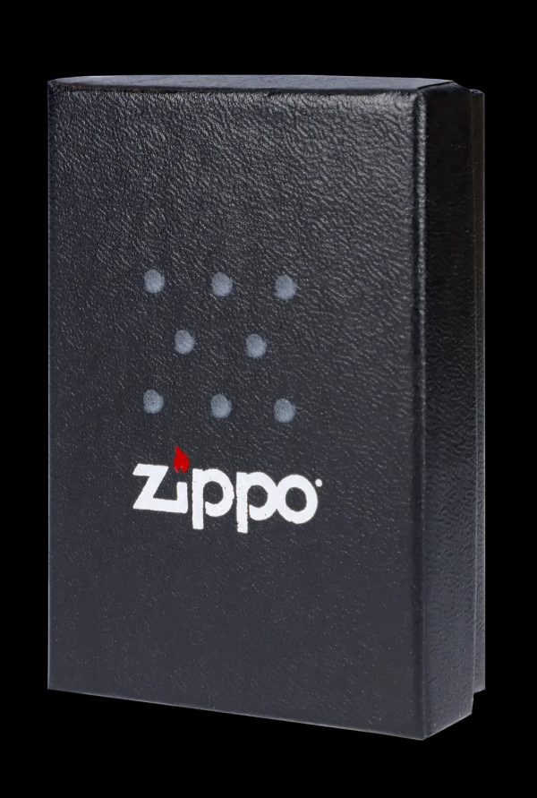 Black Zippo lighter with cannabis leaf pattern.