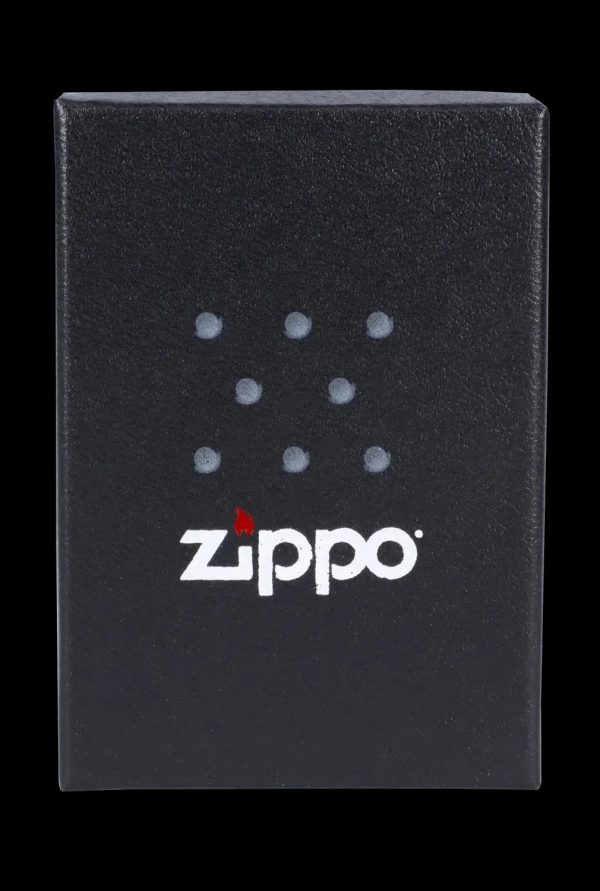 Black Zippo lighter with cannabis leaf design.
