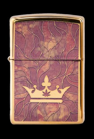 Gold lighter engraved with a crown and cannabis leaf.
