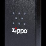 Black Zippo lighter with constellation-like dot pattern.