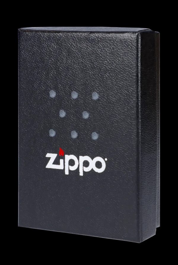 Black Zippo lighter with constellation-like dot pattern.