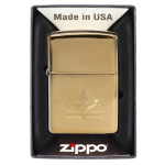 Gold Zippo lighter engraved with a cannabis leaf design in its packaging.