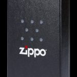 Black Zippo lighter with a constellation pattern, commonly used for cannabis consumption.