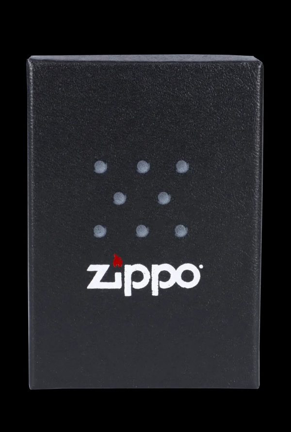 Black Zippo lighter with cannabis leaf pattern.
