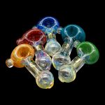 Assorted glass smoking pipes in vibrant colors against a black background.