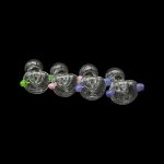 A row of colorful glass cannabis bubblers against a black background.