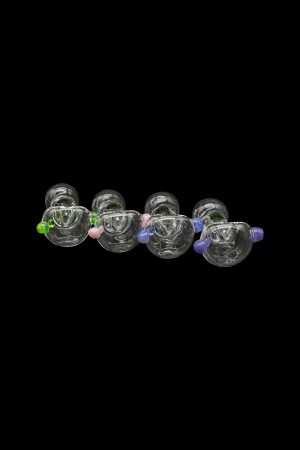 A row of colorful glass cannabis bubblers against a black background.