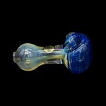 Hand-blown glass pipe with blue and yellow swirls against a black background.