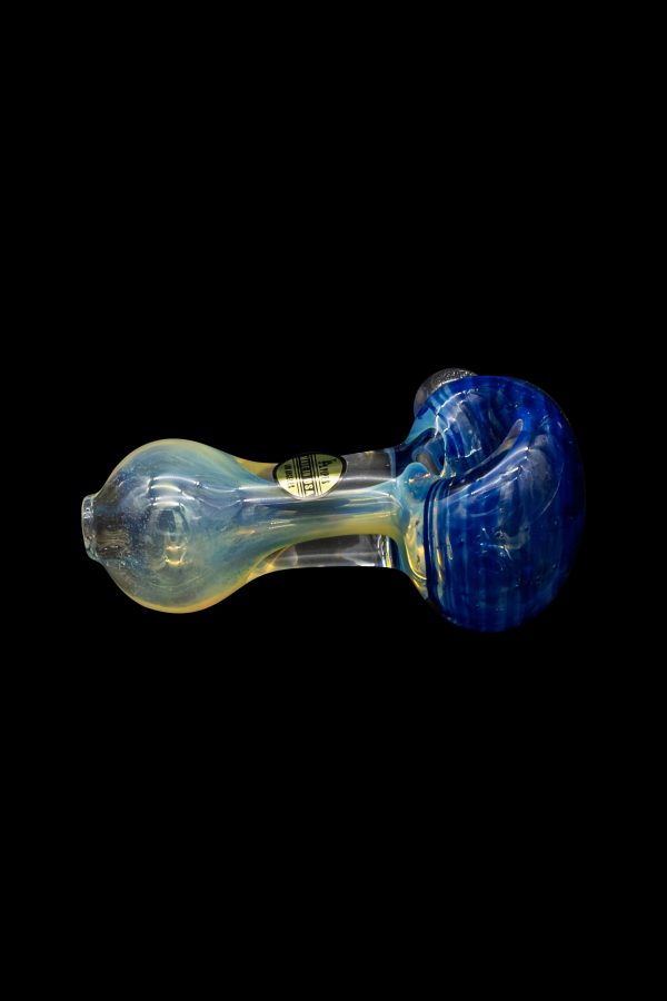 Hand-blown glass pipe with blue and yellow swirls against a black background.