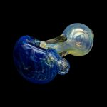 Blue and iridescent glass pipe against a black background.