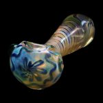Hand-blown glass pipe with iridescent blue and gold floral details.