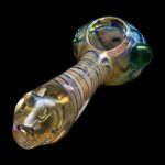 Hand-blown glass pipe with iridescent swirls, isolated on black.