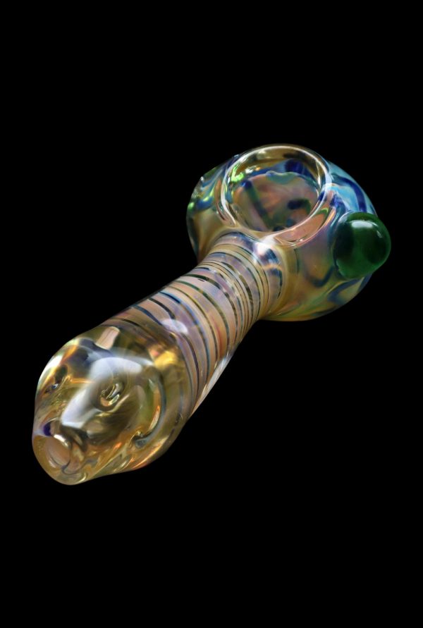 Hand-blown glass pipe with iridescent swirls, isolated on black.