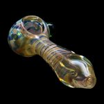 Hand pipe with colorful glass swirls.