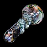 Iridescent glass smoking pipe with spiral pattern.