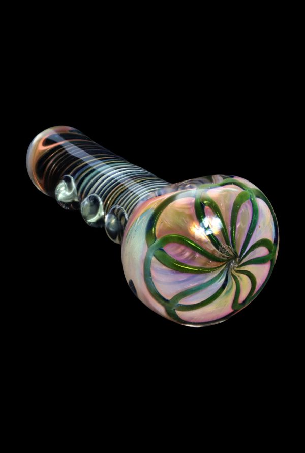 Hand-blown glass pipe with iridescent floral pattern.
