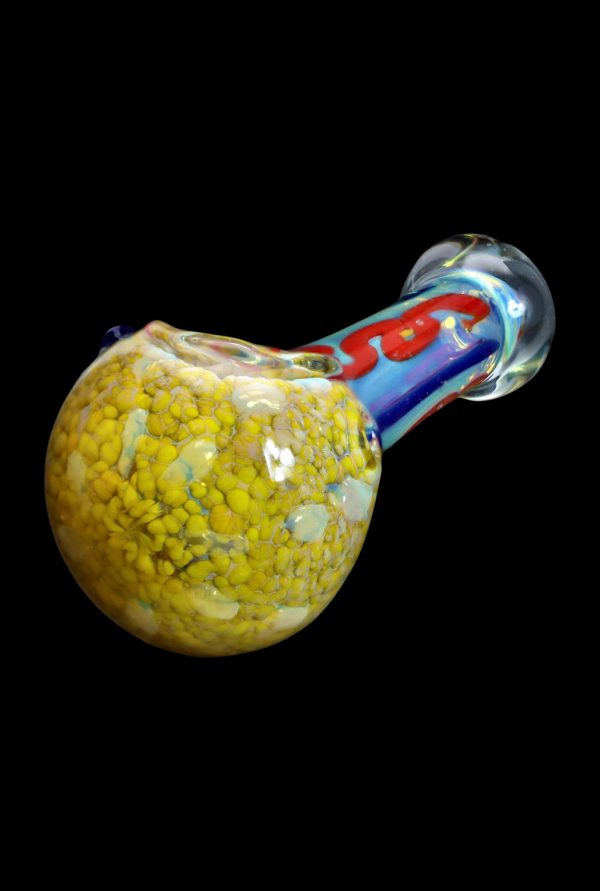 Hand-blown glass pipe with a speckled yellow and gold bowl and colorful stem.