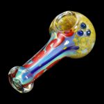Colorful glass smoking pipe with textured bowl against a black background.