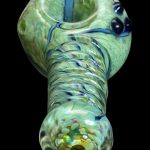 Hand-blown glass pipe with green and blue swirls.