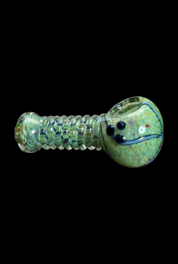 Green glass pipe with colorful swirling patterns and a sculpted face on the bowl.
