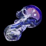 Glass cannabis pipe with swirling blue and purple patterns.