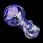 Hand pipe with intricate purple and white glasswork.