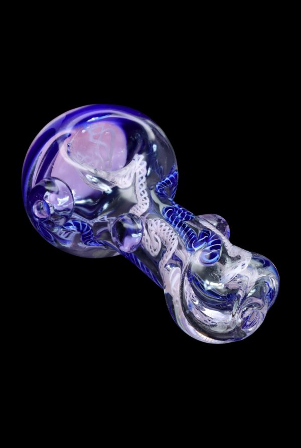 Hand pipe with intricate purple and white glasswork.