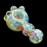 Hand-blown glass pipe with iridescent swirls and red accents.