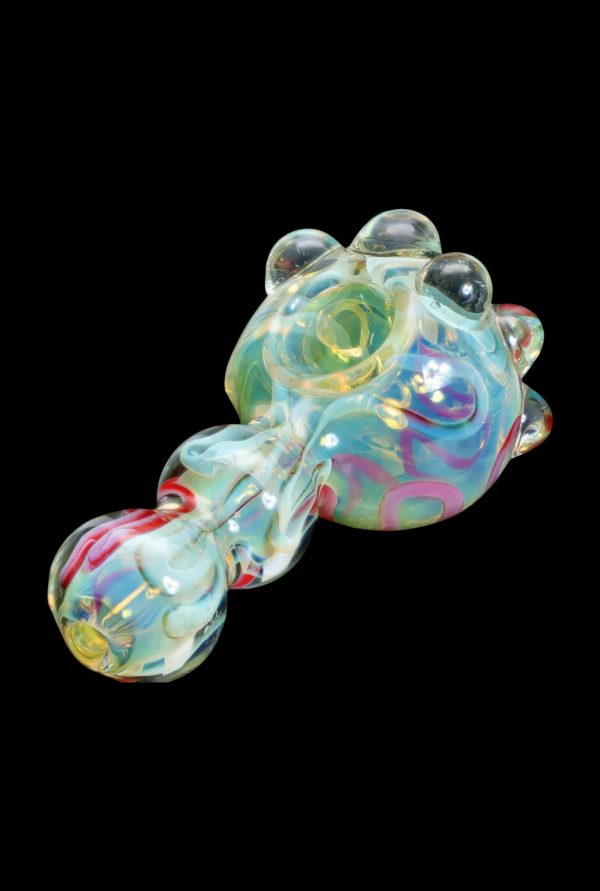 Glass cannabis pipe with iridescent swirls and bubble-like formations.
