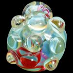 Hand-blown glass cannabis dab rig with colorful swirling patterns.