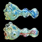 Hand-blown glass pipes with colorful swirls and textured surfaces, displayed against a black background.