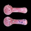 Pink glass smoking pipes with swirling purple accents, isolated on a black background.