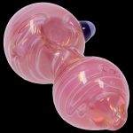 Pink glass bubbler for smoking cannabis.