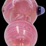 Pink glass bubbler with swirling patterns and a dark mouthpiece.