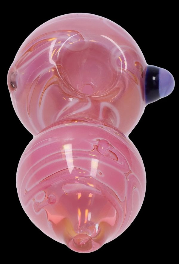 Pink glass bubbler with swirling patterns and a dark mouthpiece.