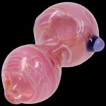Pink glass bubbler pipe with swirling patterns and a blue mouthpiece.